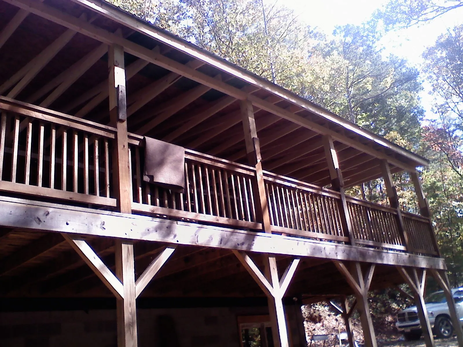 Timber framing under a new elevated porch and deck — Roof Leak Repair in Cooperstown by Roofing Brothers